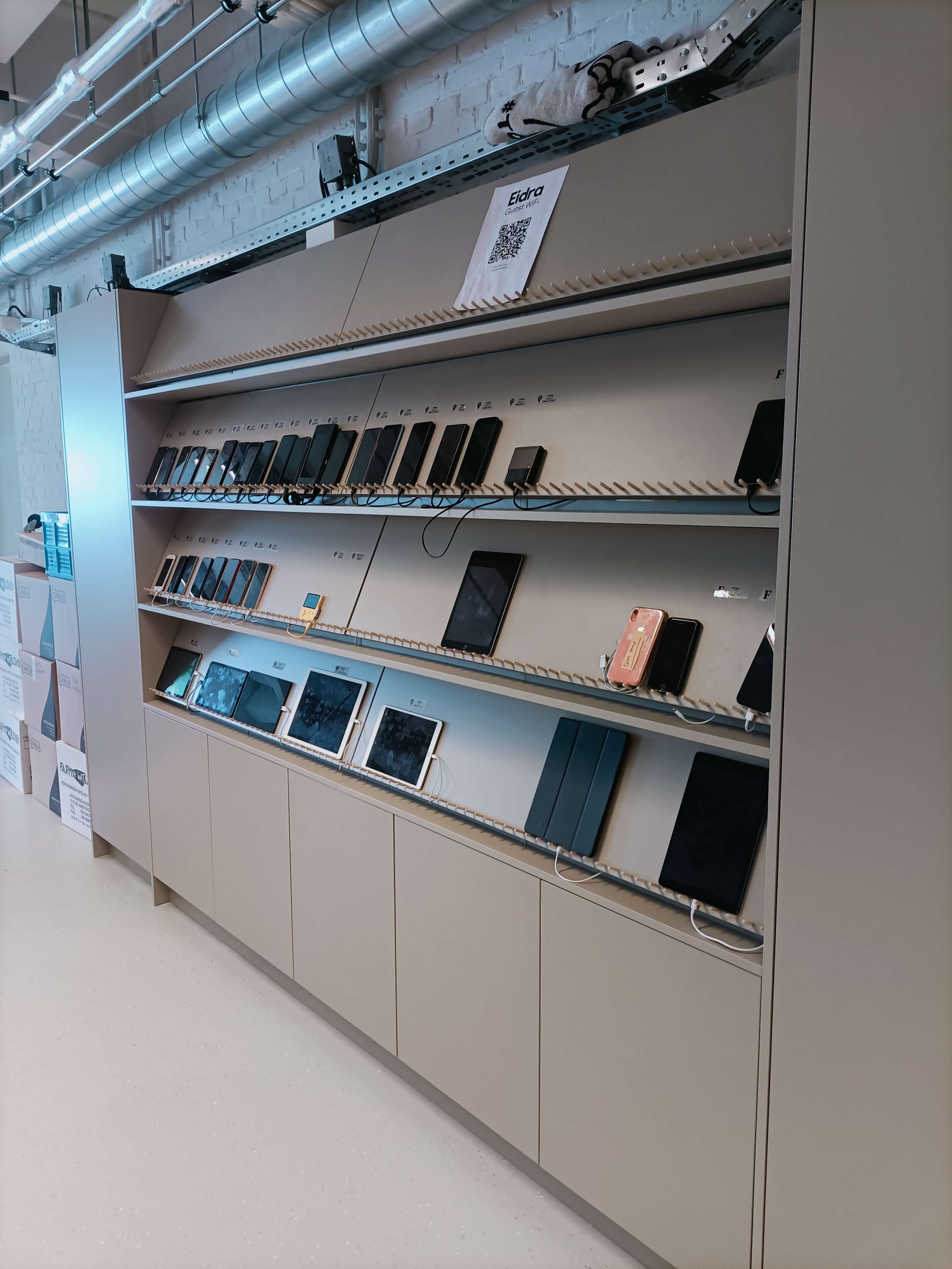 a wall with all different kind of devices displayed